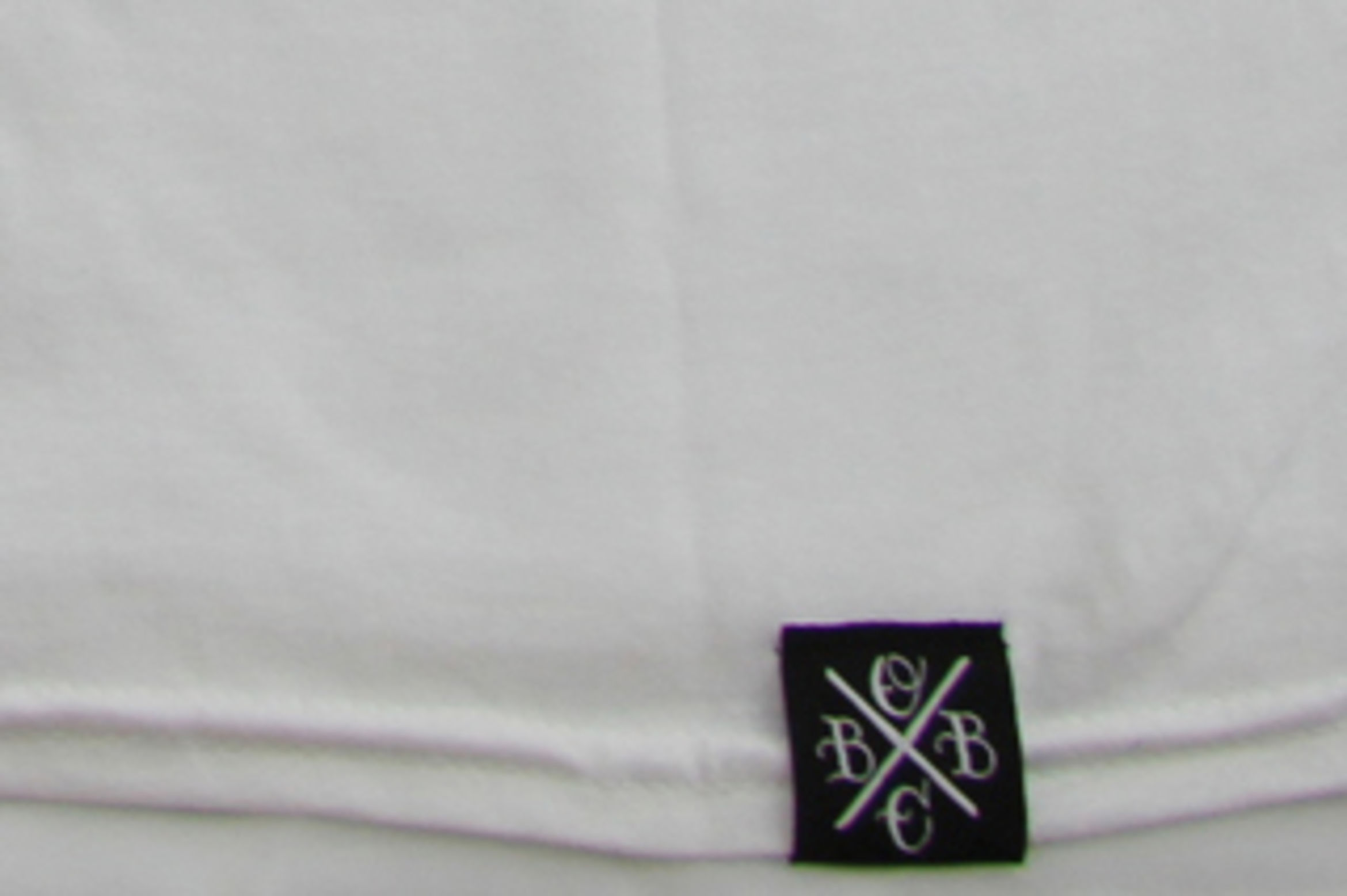 Hem tags sewn onto the bottom of garments are a great way to increase brand awareness